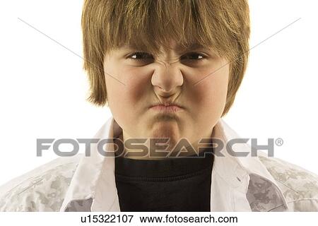 Stock Photo - Young boy making silly face. Fotosearch