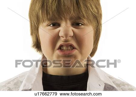 Stock Photo - Young boy making silly face. Fotosearch