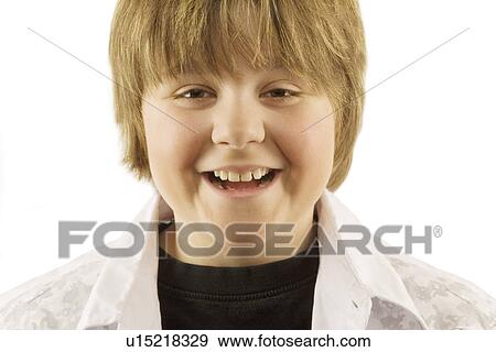Young boy smiling View Large Photo Image Stock Photo - Young boy smiling. Fotosearch