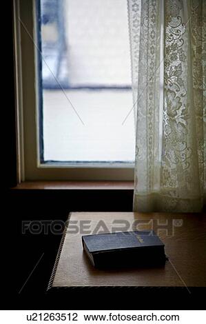 A Bible on a table View Large Photo Image Stock Image - A Bible on a table. Fotosearch