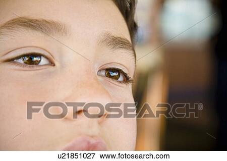 Stock Photo - A closeup of a child's face. Fotosearch