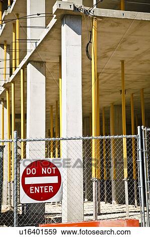 Stock Photo - A fenced in construction site. Fotosearch