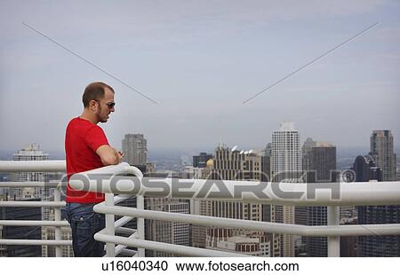 A man viewing downtown Chicago View Large Photo Image Stock Image - A man viewing downtown Chicago. Fotosearch