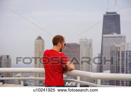 A man viewing downtown Chicago View Large Photo Image Stock Photography - A man viewing downtown Chicago. Fotosearch