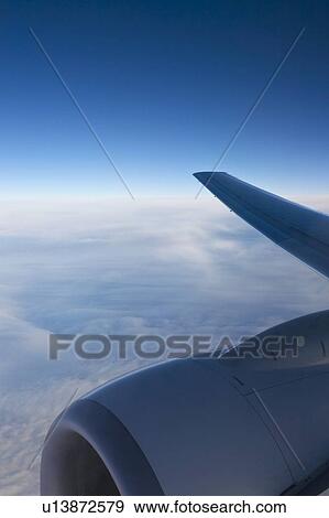 Airplane wing and engine View Large Photo Image Stock Photo - Airplane wing and engine. Fotosearch