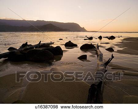 Stock Photo - Beach with rocks, Kaui, Hawaii. Fotosearch