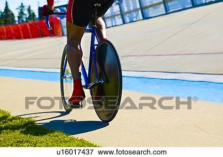 Biker on a track View Large Photo Image Stock Photo - Biker on a track. Fotosearch