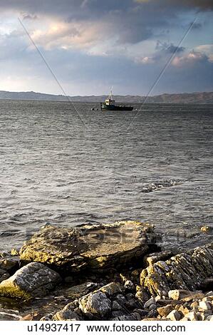 Boat in the water, Loch Sunart, Scotland View Large Photo Image Stock Photo - Boat in the water, Loch Sunart, Scotland. Fotosearch