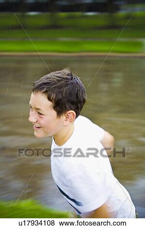 Stock Photo - Boy running. Fotosearch