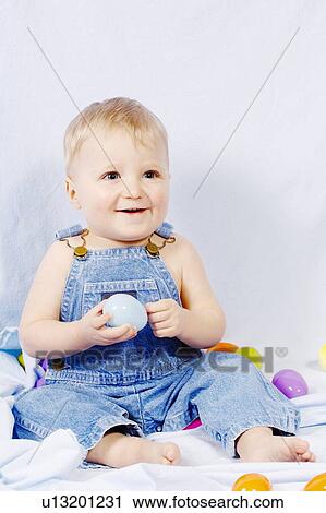 Boy with easter eggs View Large Photo Image Stock Image - Boy with easter eggs. Fotosearch
