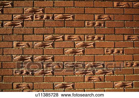 Brick wall with a fish motif, Bridlington, England View Large Photo Image Stock Photo - Brick wall with a fish motif, Bridlington, England. Fotosearch