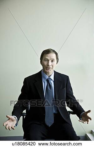 Stock Image - Businessman explaining. Fotosearch
