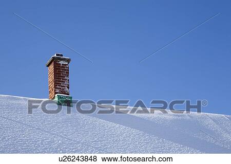 Chimney on a snowy roof View Large Photo Image Stock Photo - Chimney on a snowy roof. Fotosearch