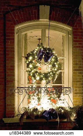 Stock Photo - Christmas decorations on a window. Fotosearch