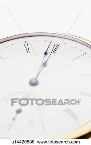 Stock Photo - Close up of a clock face. Fotosearch