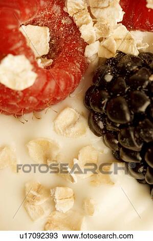 Close up of berries in yogourt View Large Photo Image Stock Image - Close up of berries in yogourt. Fotosearch