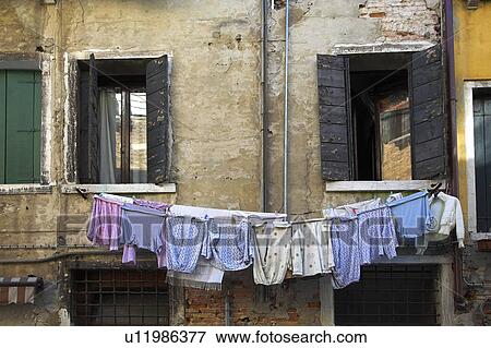 Clothing drying on the line, Venice, Italy View Large Photo Image Stock Photo - Clothing drying on the line, Venice, Italy. Fotosearch