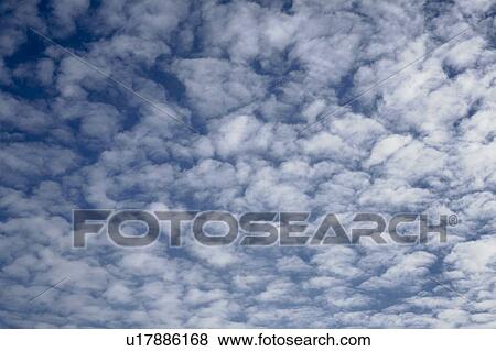 Clouds in the sky View Large Photo Image Stock Photo - Clouds in the sky. Fotosearch