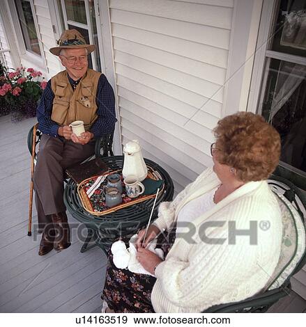 Stock Photo - Couple on the porch. Fotosearch