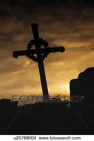 Picture - Cross at sunset . Fotosearch