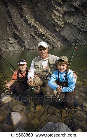 Father and sons in a mountain fly fishing river, Nordegg, Alberta, Canada View Large Photo Image Stock Image - Father and sons in a mountain fly fishing river, Nordegg, Alberta, Canada . Fotosearch