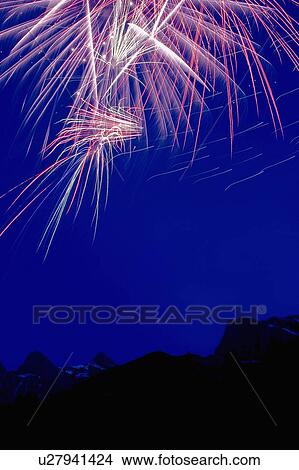 Picture - Fireworks over the mountains. Fotosearch