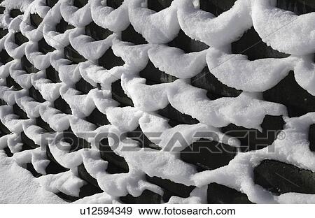 Fresh snow on a chain link fence View Large Photo Image Stock Photo - Fresh snow on a chain link fence. Fotosearch