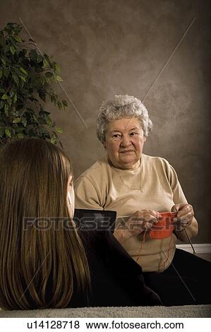Grandchild and Grandmother spending time together View Large Photo Image Stock Photo - Grandchild and Grandmother spending time together. Fotosearch