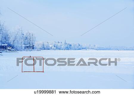 Ice rink on a snowy landscape View Large Photo Image Stock Image - Ice rink on a snowy landscape. Fotosearch