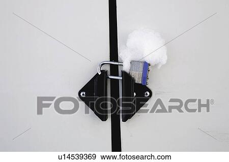 Lock on door handles covered with snow View Large Photo Image Stock Photo - Lock on door handles covered with snow. Fotosearch