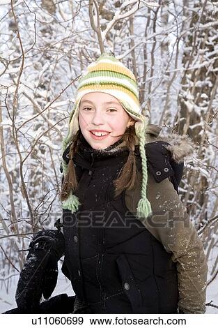 Portrait of girl in winter clothing View Large Photo Image Stock Photo - Portrait of girl in winter clothing. Fotosearch
