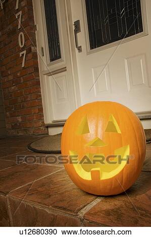 Pumpkin sitting on door step View Large Photo Image Stock Image - Pumpkin sitting on door step. Fotosearch