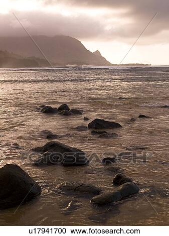 Rocks in the water, Hanalei Bay, Kauai, Hawaii View Large Photo Image Stock Image - Rocks in the water, Hanalei Bay, Kauai, Hawaii. Fotosearch