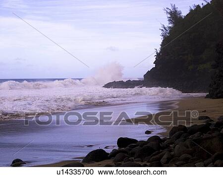 Rocks on a beach, Napali Coast State Park, Kauai, Hawaii View Large Photo Image Stock Image - Rocks on a beach, Napali Coast State Park, Kauai, Hawaii. Fotosearch