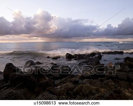 Rocks on shore, Poipu, Kauai, Hawaii View Large Photo Image Stock Image - Rocks on shore, Poipu, Kauai, Hawaii. Fotosearch