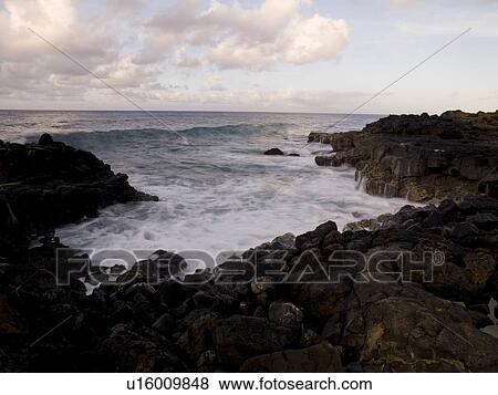 Rocks on water's edge, Kauai, Hawaii View Large Photo Image Stock Photo - Rocks on water's edge, Kauai, Hawaii. Fotosearch