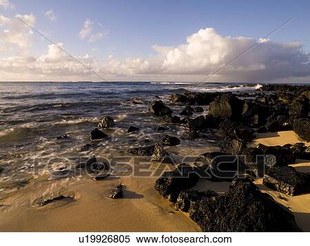 Stock Photography - Rocky shoreline, Poipu, Kauai, Hawaii. Fotosearch