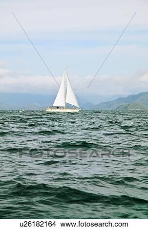 Sailboat on choppy water View Large Photo Image Picture - Sailboat on choppy water. Fotosearch