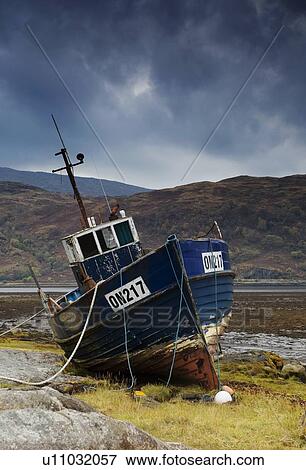Shipwrecked boat in Loch Sunart, Scotland View Large Photo Image Stock Photo - Shipwrecked boat in Loch Sunart, Scotland. Fotosearch