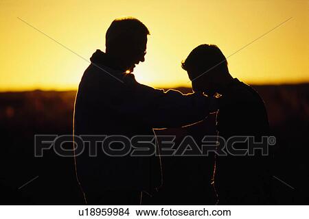 Silhouette of a father and son View Large Photo Image Picture - Silhouette of a father and son. Fotosearch
