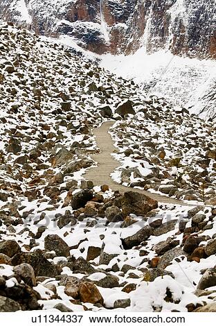 Snow covered rocks View Large Photo Image Stock Photo - Snow covered rocks. Fotosearch