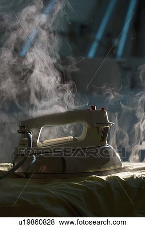 Stock Photo - Steaming iron. Fotosearch