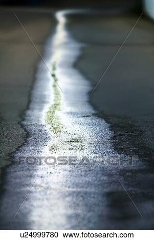 Trail of liquid on ground View Large Photo Image Stock Image - Trail of liquid on ground. Fotosearch