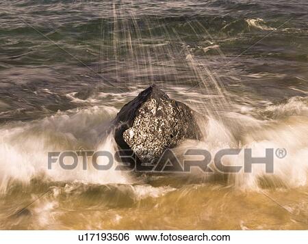 Water splashing on a rock, Poipu, Kauai, Hawaii View Large Photo Image Stock Photograph - Water splashing on a rock, Poipu, Kauai, Hawaii. Fotosearch