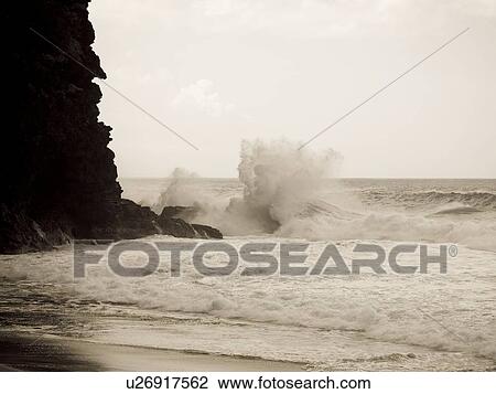 Waves against a cliff, Napali Coast State Park, Kauai, Hawaii View Large Photo Image Stock Image - Waves against a cliff, Napali Coast State Park, Kauai, Hawaii. Fotosearch