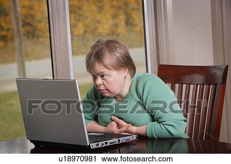 Woman with a laptop View Large Photo Image Stock Image - Woman with a laptop. Fotosearch