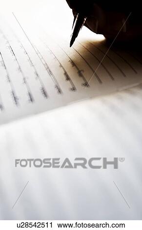 Writing in a journal View Large Photo Image Stock Image - Writing in a journal. Fotosearch