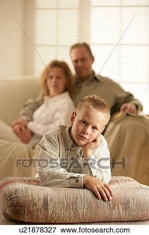 A boy and his parents View Large Photo Image Stock Photo - A boy and his parents. Fotosearch