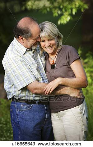 Stock Photo - A couple in the park. Fotosearch