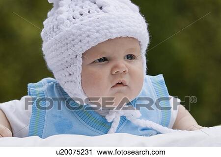 Baby boy with hat View Large Photo Image Stock Image - Baby boy with hat. Fotosearch